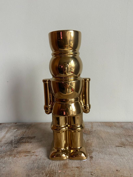 Vase casse-noix doré