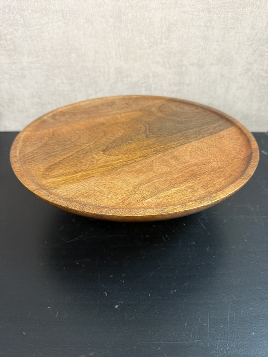 Bruin houten Plateau Mango op voet met een ronde vorm en zichtbare natuurlijke houtnerf.