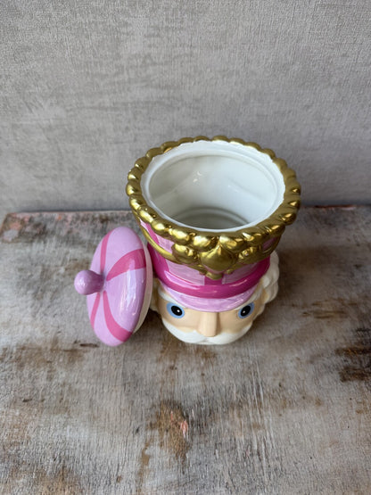 Roze keramieken voorraadpot Notenkraker met gouden details en deksel.
